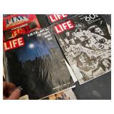 Lot of Vintage TIME and LIFE Magazines from historical events such as the moon landing, the Nixon era, and significant cultural milestones from the 1960s