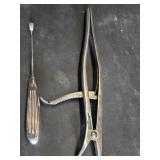 Wall Chart of Human Anatomy and Vintage Medical Instruments