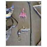 Equestrian Riding Accessories including Masks, Whip, and Bridles