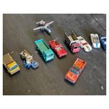 Assorted Vintage Die-Cast Vehicles and Airplane Toys