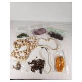 Assorted Jewelry and Beads Lot Including Shell Necklaces and Beaded Strands
