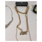 Assorted Jewelry including Cubic Zirconia Pendant Set, Gold-Tone Necklaces, and Stone Pendant Necklace