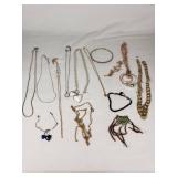 Mixed Jewelry Collection including Necklaces, Bracelets, and Pendants