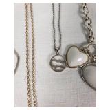 Mixed Jewelry Collection including Necklaces, Bracelets, and Pendants