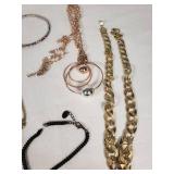 Mixed Jewelry Collection including Necklaces, Bracelets, and Pendants