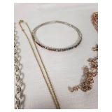 Mixed Jewelry Collection including Necklaces, Bracelets, and Pendants