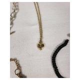 Mixed Jewelry Collection including Necklaces, Bracelets, and Pendants