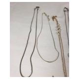 Mixed Jewelry Collection including Necklaces, Bracelets, and Pendants