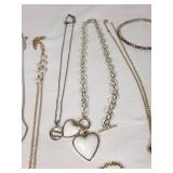 Mixed Jewelry Collection including Necklaces, Bracelets, and Pendants