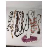 Lot of Fashion Necklaces and Accessories Including Beaded and Chain Styles, Leather Cord Pendant, and Crocheted Choker