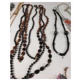 Lot of Fashion Necklaces and Accessories Including Beaded and Chain Styles, Leather Cord Pendant, and Crocheted Choker