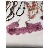 Lot of Fashion Necklaces and Accessories Including Beaded and Chain Styles, Leather Cord Pendant, and Crocheted Choker