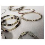 Lot of Mixed Jewelry Items including Bracelets, Bangles, and Wristbands