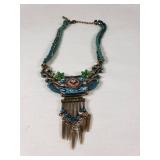 Bohemian Style Statement Necklace with Antique Brass, Beads, and Fabric