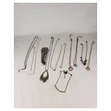 Lot of Necklaces and Pendants Featuring Heart Designs and Various Chains
