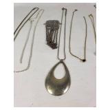 Lot of Necklaces and Pendants Featuring Heart Designs and Various Chains