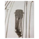 Lot of Necklaces and Pendants Featuring Heart Designs and Various Chains