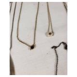 Lot of Necklaces and Pendants Featuring Heart Designs and Various Chains