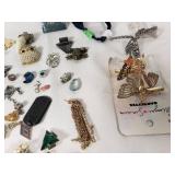 Assorted Jewelry Lot Including Vintage Brooches, Pendants, and Charms