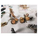 Assorted Jewelry Lot Including Vintage Brooches, Pendants, and Charms
