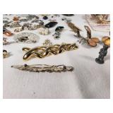 Assorted Jewelry Lot Including Vintage Brooches, Pendants, and Charms