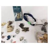 Assorted Jewelry Lot Including Vintage Brooches, Pendants, and Charms