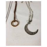 Assorted Necklaces and Pendants Including Moon and Butterfly Designs