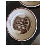 Set of Vintage plates featuring buildings with "I.O.O.F." and "1914" markings , Glass Juicer, and Christmas-Themed Jar