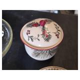 Set of Vintage plates featuring buildings with "I.O.O.F." and "1914" markings , Glass Juicer, and Christmas-Themed Jar