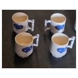 Set of Ceramic Mugs with Blue Floral and Windmill Designs