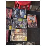 PlayStation 2 Video Games Collection including Guitar Hero III: Legends of Rock, Sly Cooper, and Baldur