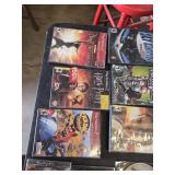 PlayStation 2 Video Games Collection including Guitar Hero III: Legends of Rock, Sly Cooper, and Baldur