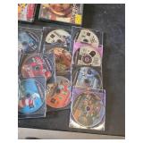 PlayStation 2 Video Games Collection including Guitar Hero III: Legends of Rock, Sly Cooper, and Baldur