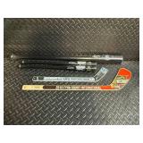 Minnesota Twins Ben Revere Bat and assorted mini Baseball Bats and Mini Hockey Sticks