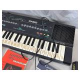 Casio Keyboard with Assorted Music