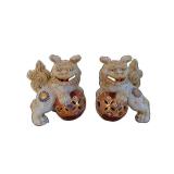 Pair of Foo Dog Ceramic Figurines with Openwork Lattice Bodies