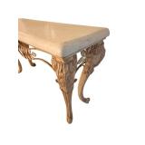 61 x 20 x 35 Faux Stone-Top Table with Ornate Carved Leaf Motif