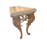 61 x 20 x 35 Faux Stone-Top Table with Ornate Carved Leaf Motif