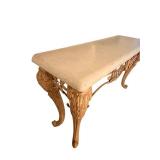 61 x 20 x 35 Faux Stone-Top Table with Ornate Carved Leaf Motif