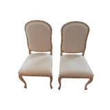 Pair of Carved Wood Dining Chairs with Upholstered Diamond-Pattern Seats