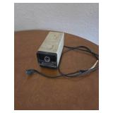 Vintage pencil sharpener with desk lamp