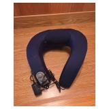 Massaging neck rest with heat