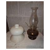 Vintage oil lamp and white shade