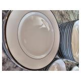 white and silver rimed dishes