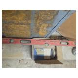 Box of woodworking staples and a Leveler