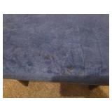 Vintage wooden footrest with blue cushioned top
