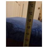 Vintage wooden footrest with blue cushioned top