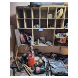 Table And Shelf Full Of Hardware And Tools