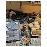 Table And Shelf Full Of Hardware And Tools