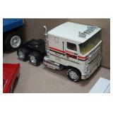 Assorted Toy Cars and Trailers